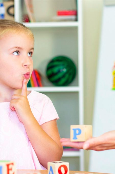 speech-therapist-teaches-the-girl-to-say-the-letter